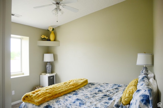 1087 E Fort Pierce Dr, St George, UT 84790 - carpeted bedroom featuring baseboards, a ceiling fan, and visible vents