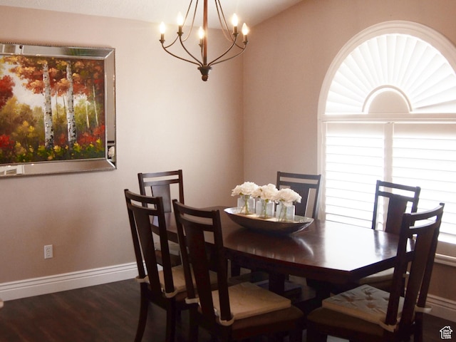 1087 E Fort Pierce Dr, St George, UT 84790 - dining area with baseboards, wood finished floors, and a chandelier