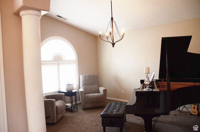 1087 E Fort Pierce Dr, St George, UT 84790 - carpeted living area featuring a chandelier, visible vents, ornate columns, and vaulted ceiling