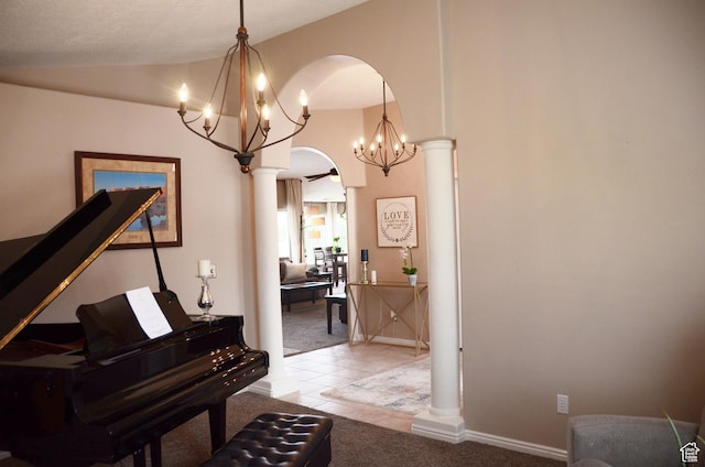 1087 E Fort Pierce Dr, St George, UT 84790 - corridor with light colored carpet, a chandelier, arched walkways, light tile patterned floors, and vaulted ceiling