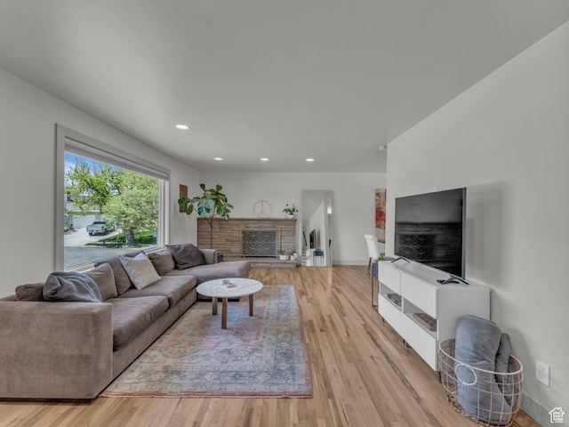4363 S Butternut Rd E, Holladay, UT 84124 - living area with recessed lighting, baseboards, a stone fireplace, and light wood finished floors