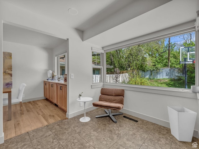 4363 S Butternut Rd E, Holladay, UT 84124 - living area featuring baseboards, plenty of natural light, and visible vents