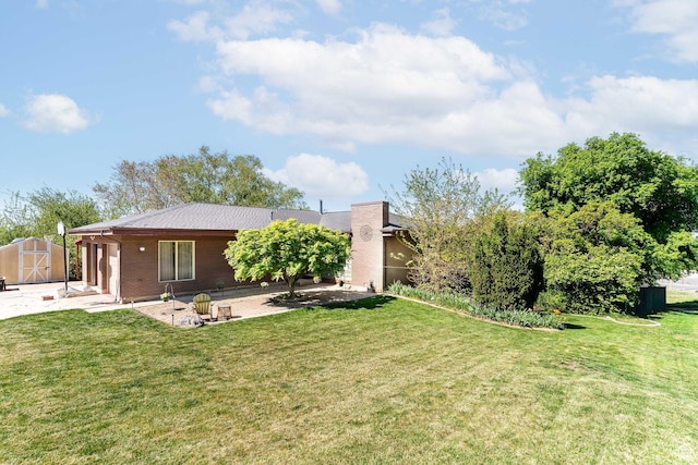 1340 E Oakmont Ln, Fruit Heights, UT 84037 - back of house with a yard, a patio, a shed, and an outbuilding