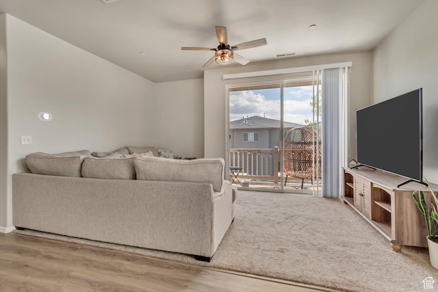 6626 W Ivy Gable Dr S, West Jordan, UT 84081 - living room featuring visible vents, a ceiling fan, and wood finished floors