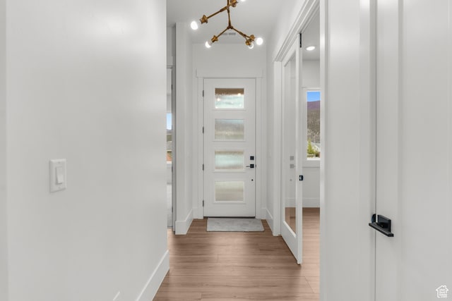 2316 S 2925 W, Cedar City, UT 84720 - entryway with light wood-style floors, baseboards, and a chandelier