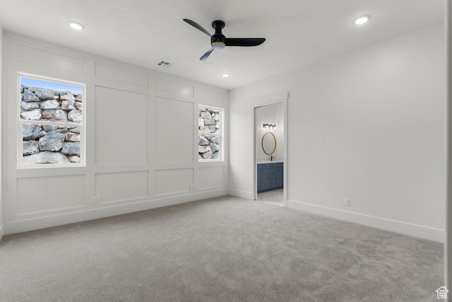 2316 S 2925 W, Cedar City, UT 84720 - unfurnished bedroom with baseboards, light carpet, a decorative wall, and recessed lighting