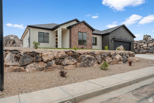 view of front of home with an attached garage and driveway
