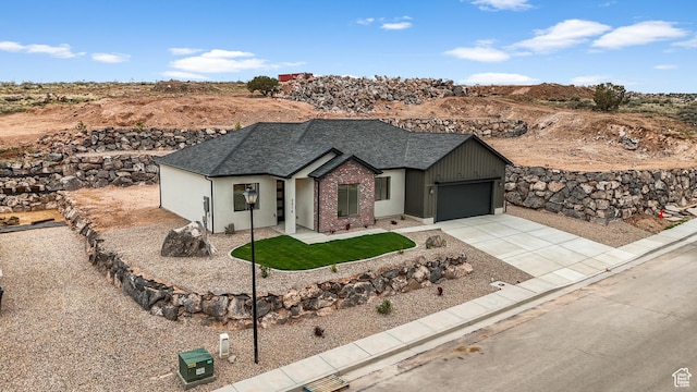 2316 S 2925 W, Cedar City, UT 84720 - single story home featuring roof with shingles, an attached garage, a front lawn, brick siding, and driveway