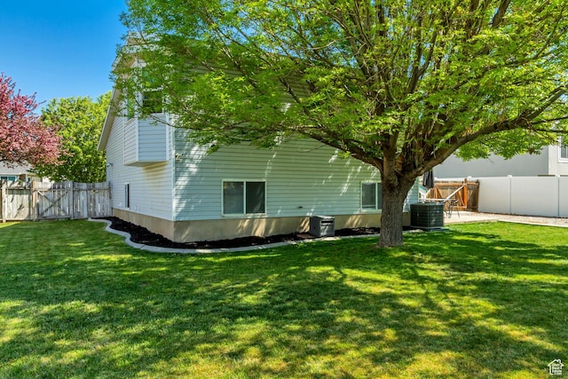 1235 W 1870 N, Lehi, UT 84043 - back of property featuring a lawn, a patio, central AC, and a fenced backyard