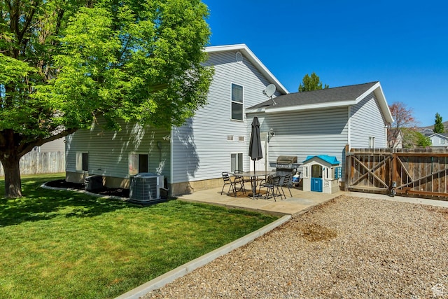 1235 W 1870 N, Lehi, UT 84043 - rear view of property featuring a lawn, fence, cooling unit, and a patio area