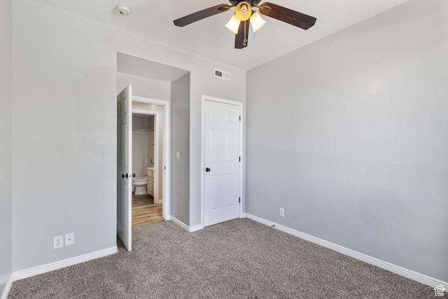 1474 S 430 W Unit 23, Orem, UT 84058 - unfurnished bedroom featuring baseboards, visible vents, ceiling fan, and carpet