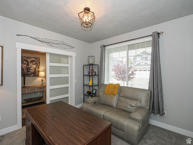 10953 S Kelso Dune Dr, South Jordan, UT 84009 - living area with an inviting chandelier, carpet floors, baseboards, and a textured ceiling