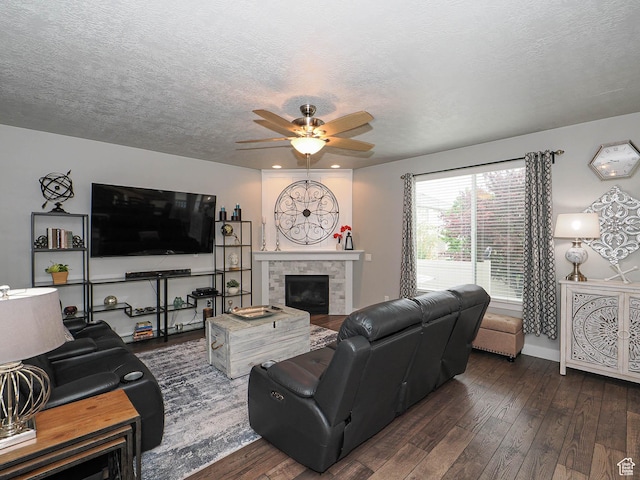 10953 S Kelso Dune Dr, South Jordan, UT 84009 - living room with dark wood-style flooring, a ceiling fan, and a textured ceiling