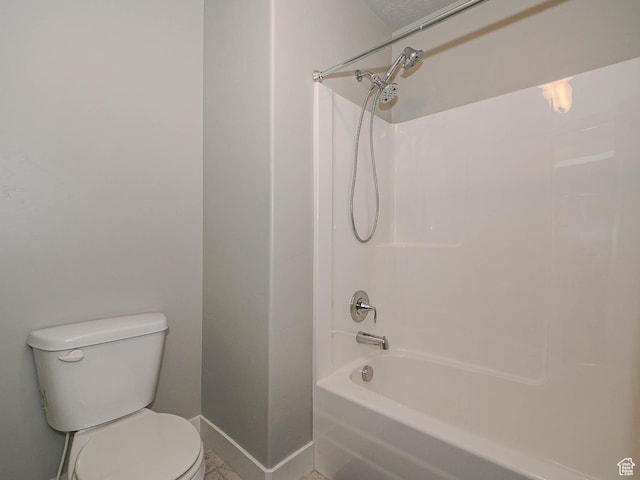 10953 S Kelso Dune Dr, South Jordan, UT 84009 - full bath featuring baseboards, washtub / shower combination, and toilet