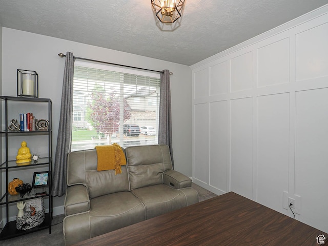 10953 S Kelso Dune Dr, South Jordan, UT 84009 - living area with a textured ceiling