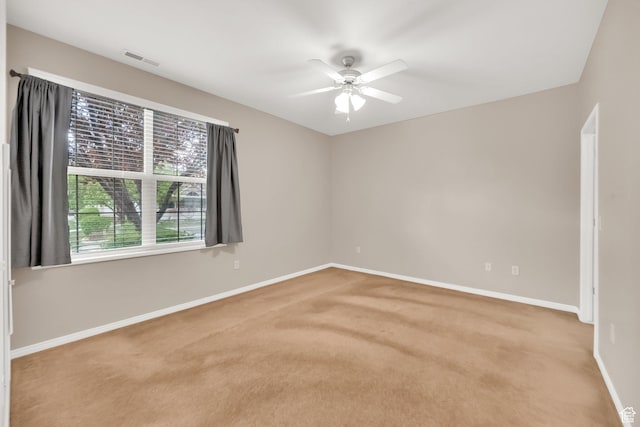 6953 S Country Home Ln W, West Jordan, UT 84084 - carpeted spare room with baseboards, a ceiling fan, and visible vents