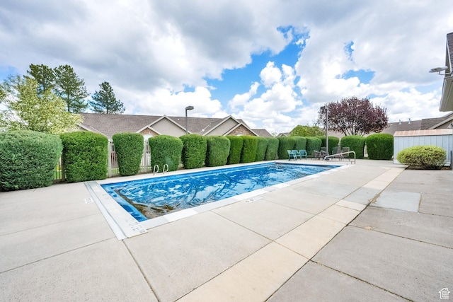 6953 S Country Home Ln W, West Jordan, UT 84084 - view of pool featuring a fenced in pool, a patio area, and fence