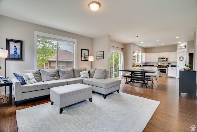 2130 S 450 E, Heber City, UT 84032 - living area with recessed lighting, an inviting chandelier, and dark wood finished floors