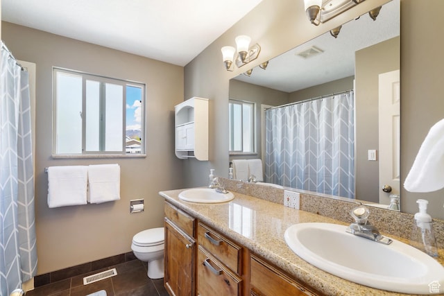 2295 E 2150 N, Layton, UT 84040 - full bathroom with toilet, visible vents, and a sink