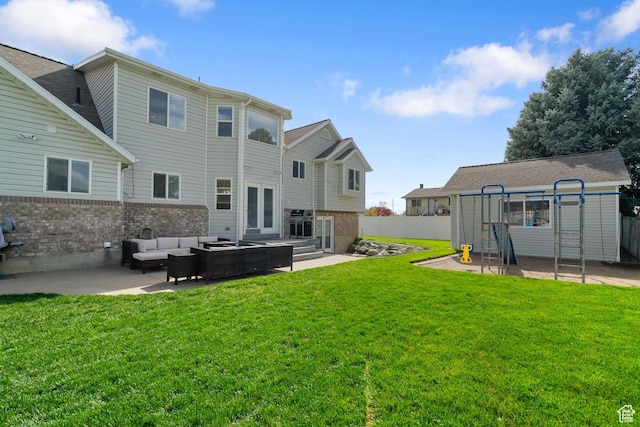 2295 E 2150 N, Layton, UT 84040 - rear view of property with an outdoor hangout area, a lawn, a patio area, and brick siding