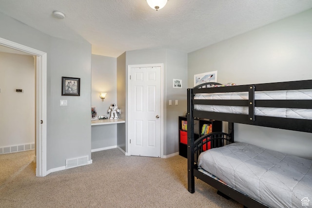 2295 E 2150 N, Layton, UT 84040 - carpeted bedroom with baseboards, a textured ceiling, and visible vents