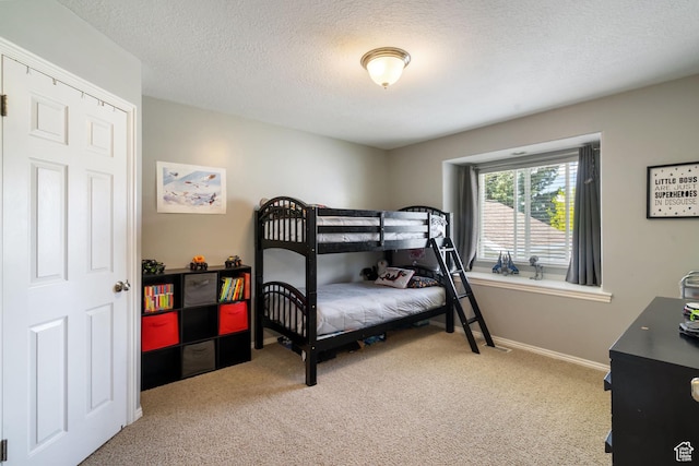 2295 E 2150 N, Layton, UT 84040 - carpeted bedroom with baseboards and a textured ceiling