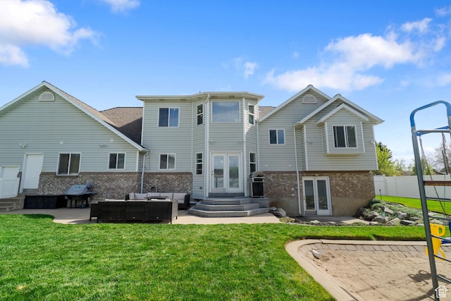 2295 E 2150 N, Layton, UT 84040 - back of house with brick siding, outdoor lounge area, french doors, and entry steps