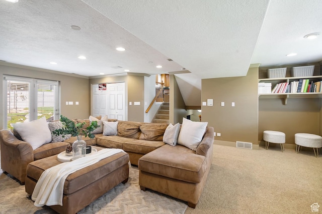 2295 E 2150 N, Layton, UT 84040 - carpeted living room with crown molding, a textured ceiling, recessed lighting, visible vents, and stairway