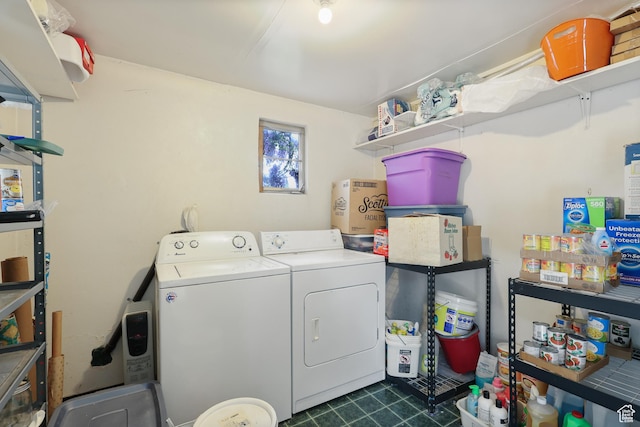 424 S 400 E, Orem, UT 84097 - laundry area featuring dark tile patterned flooring, separate washer and dryer, and laundry area