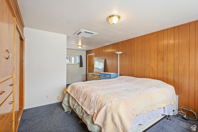 424 S 400 E, Orem, UT 84097 - bedroom featuring carpet floors, wood walls, and visible vents