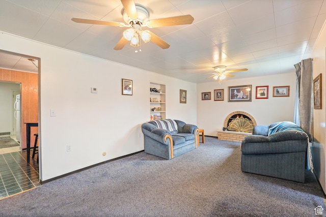 424 S 400 E, Orem, UT 84097 - living area with a ceiling fan, dark carpet, built in shelves, and visible vents