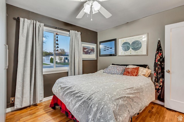 1072 S 1400 W, Salt Lake City, UT 84104 - bedroom with a ceiling fan and wood finished floors