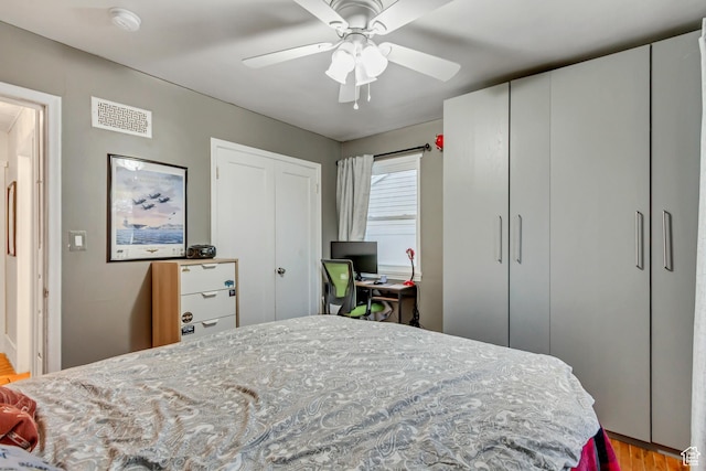 1072 S 1400 W, Salt Lake City, UT 84104 - bedroom featuring a ceiling fan, visible vents, and wood finished floors