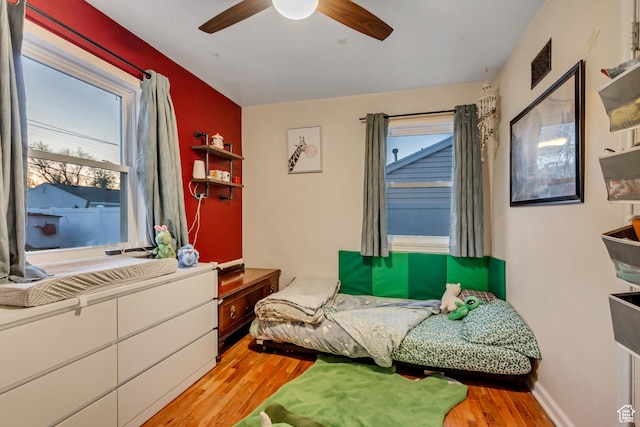 1072 S 1400 W, Salt Lake City, UT 84104 - bedroom with light wood-style floors, ceiling fan, and visible vents