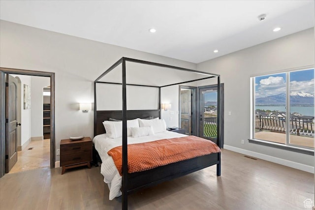 3630 S Panorama Dr W, Saratoga Springs, UT 84045 - bedroom featuring visible vents, baseboards, access to outside, recessed lighting, and light wood-type flooring