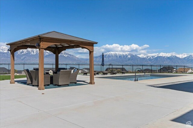 3630 S Panorama Dr W, Saratoga Springs, UT 84045 - exterior space featuring a gazebo, a mountain view, and fence