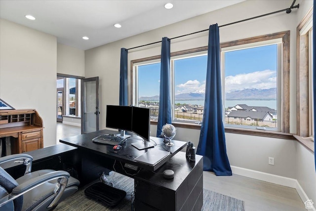 3630 S Panorama Dr W, Saratoga Springs, UT 84045 - home office with light wood-style floors, recessed lighting, baseboards, and a wealth of natural light