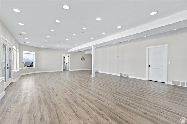 3630 S Panorama Dr W, Saratoga Springs, UT 84045 - unfurnished living room featuring recessed lighting, light wood-style flooring, and visible vents