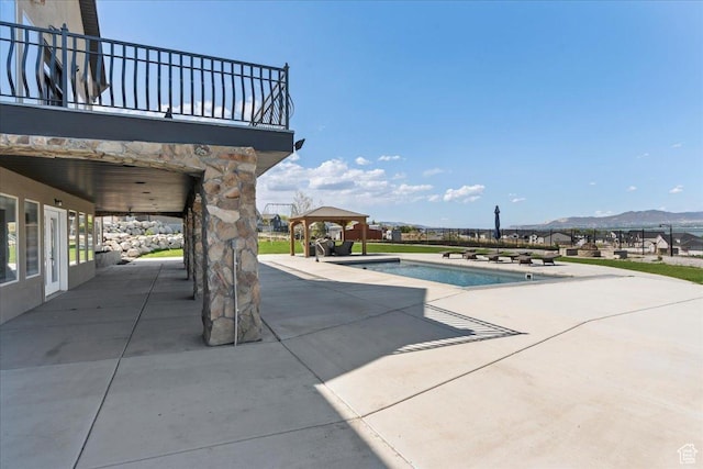 3630 S Panorama Dr W, Saratoga Springs, UT 84045 - pool with a mountain view, a gazebo, and a patio area