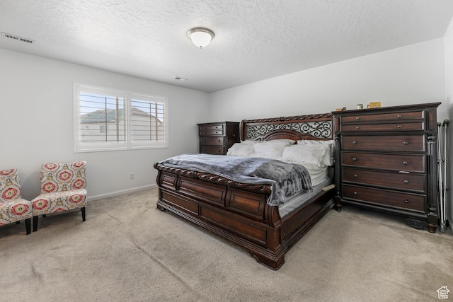 728 W Wild Hyacinth Dr, Saratoga Springs, UT 84045 - bedroom featuring light colored carpet, a textured ceiling, baseboards, and visible vents