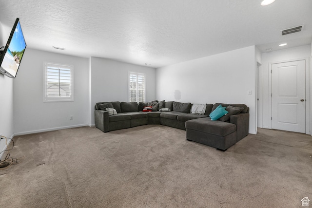 728 W Wild Hyacinth Dr, Saratoga Springs, UT 84045 - living area featuring carpet floors, a textured ceiling, and visible vents
