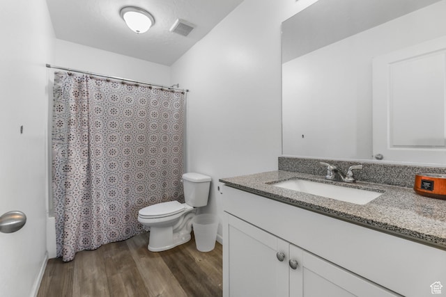 728 W Wild Hyacinth Dr, Saratoga Springs, UT 84045 - full bathroom with visible vents, vanity, wood finished floors, toilet, and baseboards