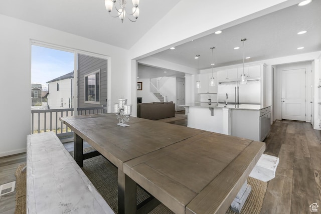 728 W Wild Hyacinth Dr, Saratoga Springs, UT 84045 - dining room with recessed lighting, dark wood finished floors, a notable chandelier, and stairway