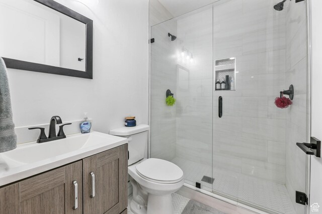 728 W Wild Hyacinth Dr, Saratoga Springs, UT 84045 - bathroom with toilet, a shower stall, and vanity