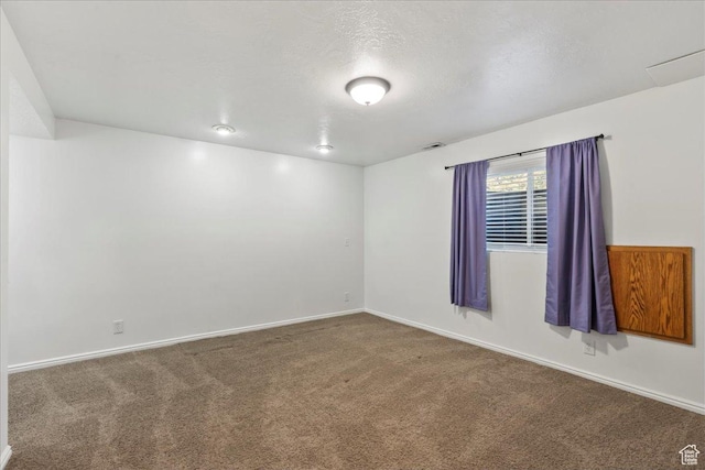 12455 S 1450 W, Riverton, UT 84065 - carpeted spare room with a textured ceiling, baseboards, and visible vents