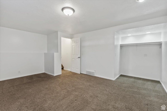 12455 S 1450 W, Riverton, UT 84065 - unfurnished bedroom with carpet floors, baseboards, visible vents, and a closet