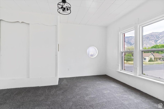95 N 200 W, Brigham City, UT 84302 - empty room with carpet floors and a mountain view