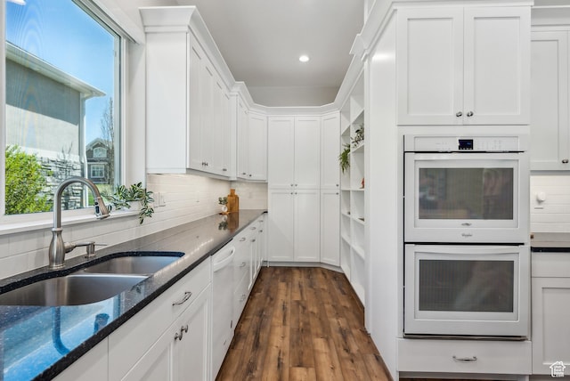 735 E 850 S, Centerville, UT 84014 - kitchen with white appliances, a sink, white cabinetry, dark stone counters, and backsplash