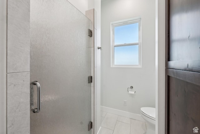 735 E 850 S, Centerville, UT 84014 - bathroom featuring a shower stall, toilet, tile patterned floors, and baseboards