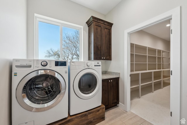 735 E 850 S, Centerville, UT 84014 - washroom with washing machine and dryer, cabinet space, and light tile patterned flooring